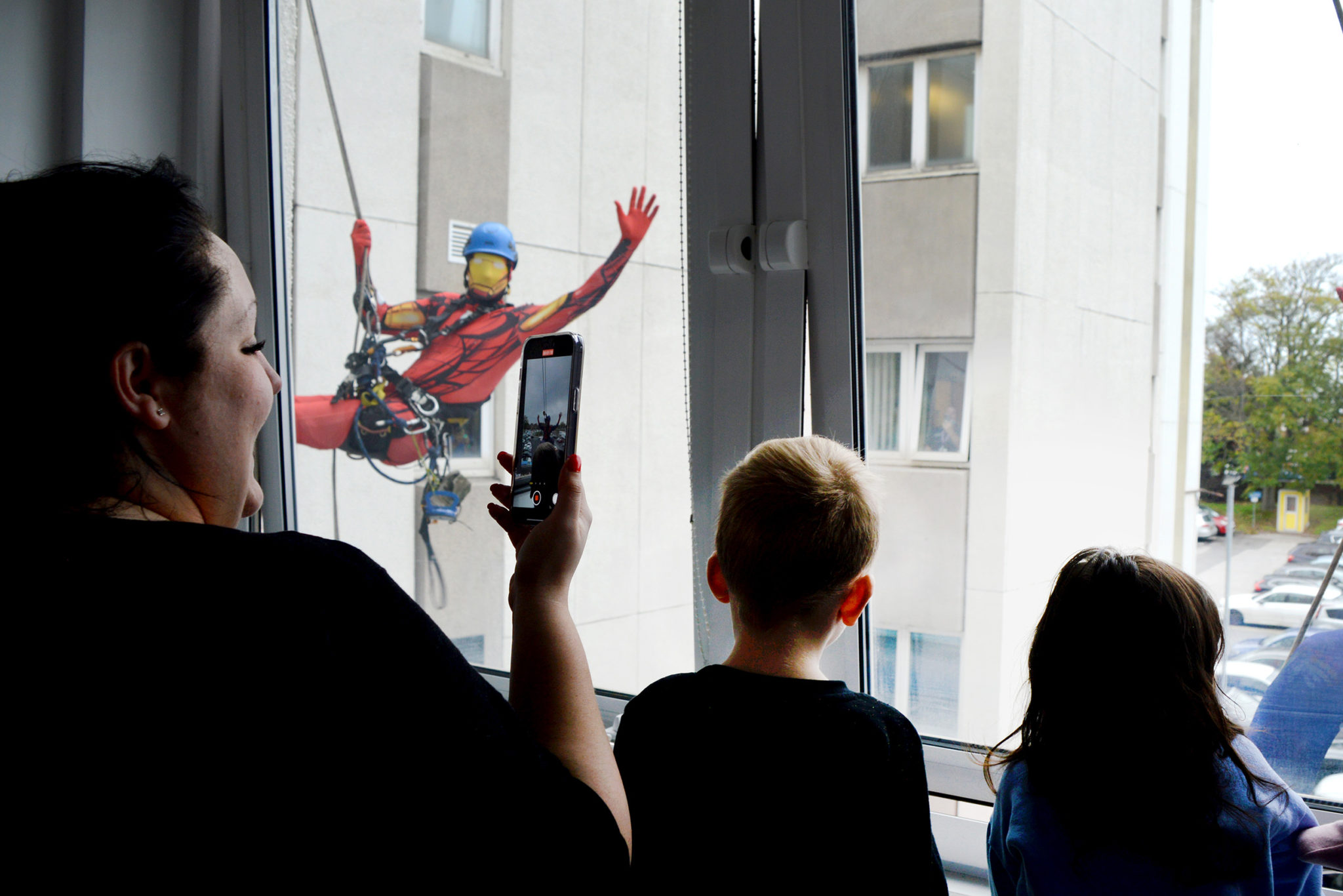 Spiderman and Iron Man spotted at parttime windowcleaning job