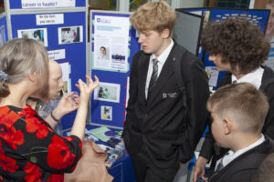 Students speak with representatives from the University of Sheffield