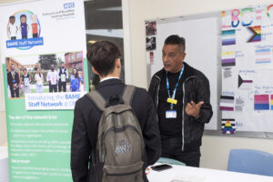 A student at the Equality, Diversity and Inclusion stand
