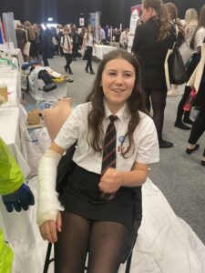 A student gets first hand experience of the techniques involved in potting and bandages.
