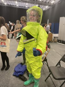 Trying on the hazardous materials suit, used as a protection when treating chemical accidents.